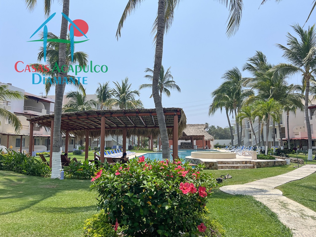 Residencial Caracol - Albercas y jardines 16